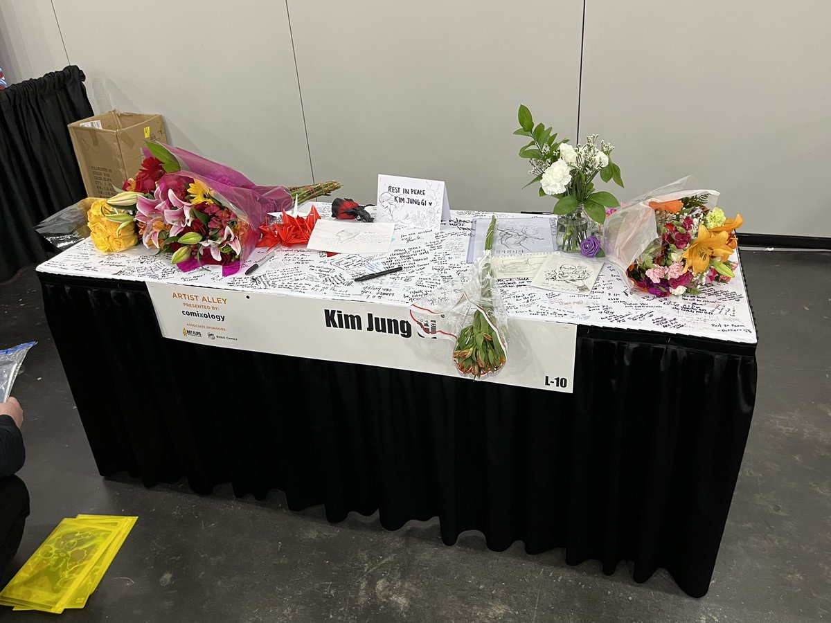 LanceDanger's tweet photo. So heartbreaking the passing of @KimJungGiUS but so touching to see the tributes at his table at Artist Alley in NYCC 🙏 https://t.co/Ceg7MPp9Af