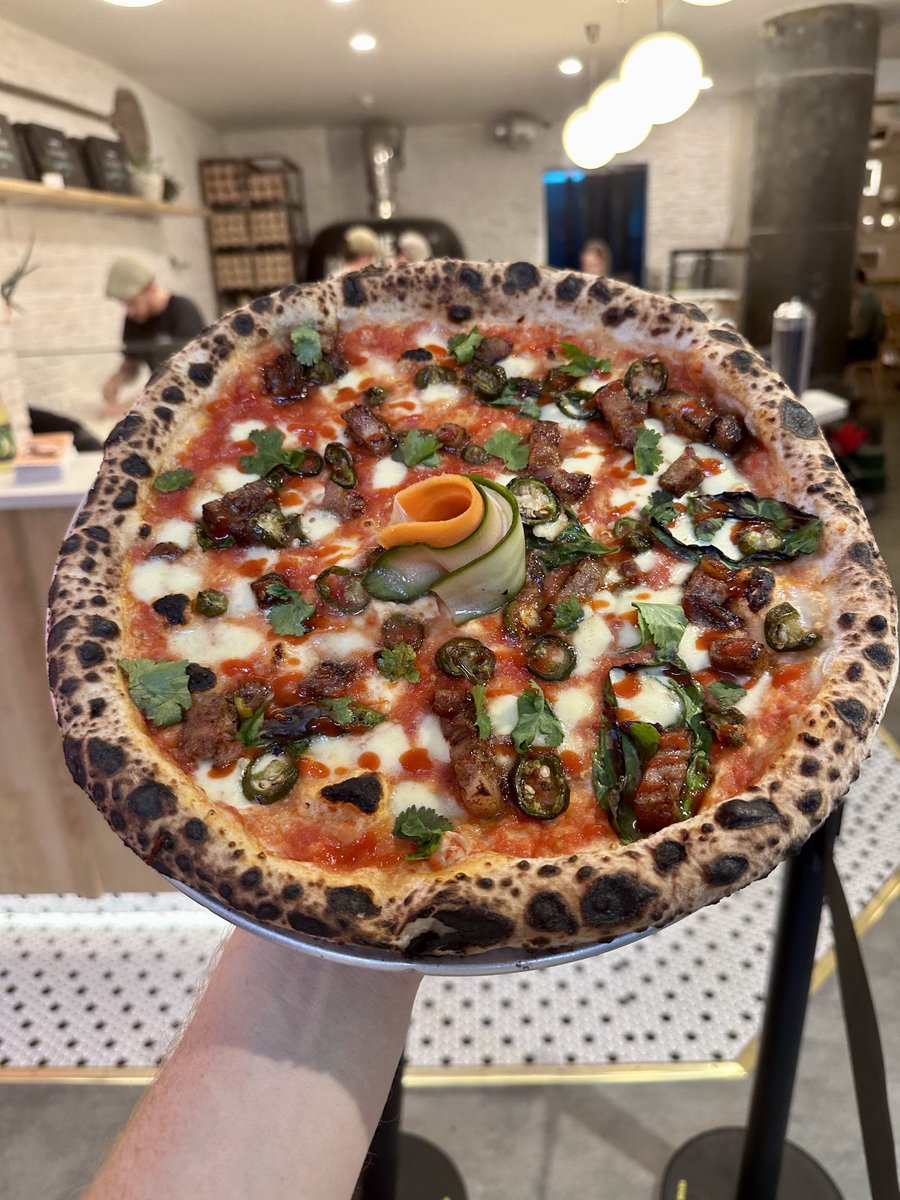 The Banh-Mi Pie, tis a wee dinger. Hertrich’s sticky icky pork belly, candied jalapeño, sriracha, coriander with pickled carrot, daikon &amp; cucumber. A royal rumble on the pallet.
#pizza #galway