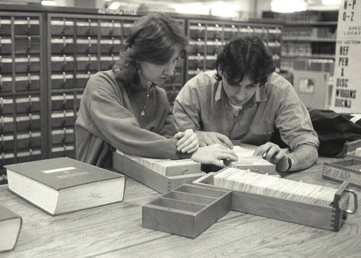 RULibraries's tweet photo. #TBT to #mullets and the days before @Google.
In this 1980s photo, two @RutgersU students at #AlexanderLibrary search for books using card catalogs. Learn more about these library treasures via QuickSearch on your Rutgers Library Mobile app.
Photo courtesy of @Rutgers_SCUA. https://t.co/504LM5UaUv