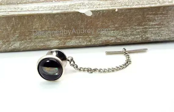 DesignsbyAudrey's tweet image. Lucious Black and Blue Tie Tac – Onyx and Abalone Inlaid Tie Tac, Black Onyx Inlaid with Blue Abalone Tie Tac – Tie Tac with Chain by #DesignedbyAudrey. Wonderful mens #handmade accessories and jewelry buff.ly/3Rz5MXa via @Etsy
