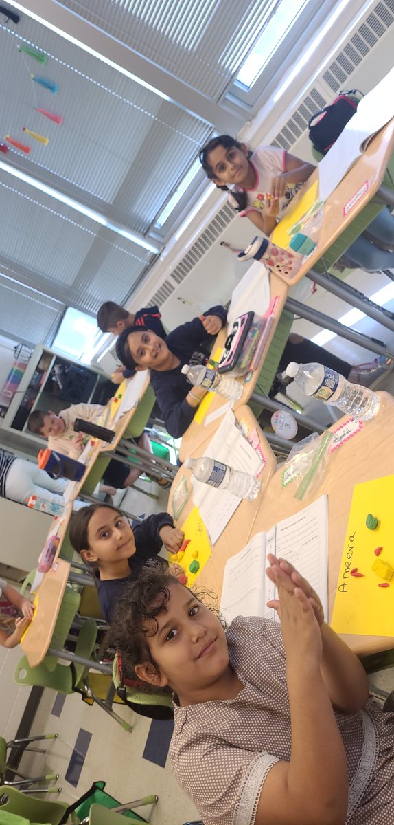 3rd Graders making offspring creatures  after learning about inherited traits.