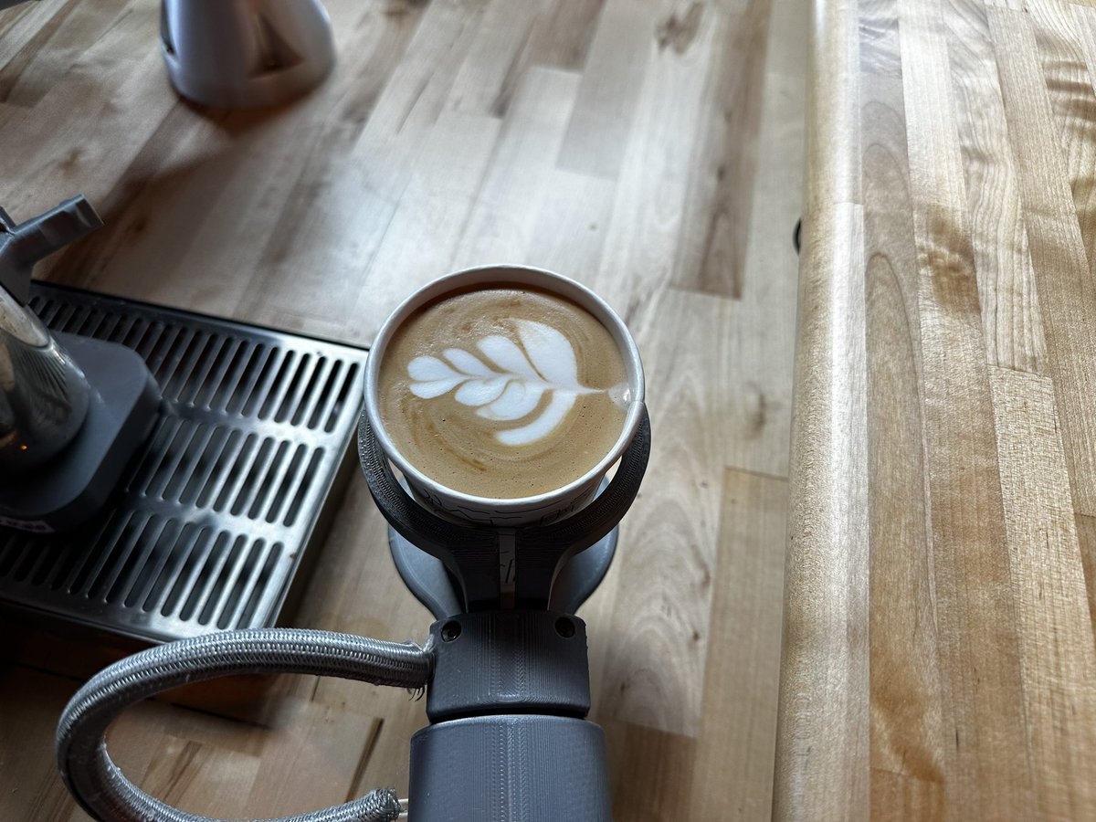 A <a href="/artlycoffee/">Artly</a> robot is making my latte <a href="/geekwire/">GeekWire</a> #2022GWSummit. I’m chatting with someone who has a PhD in robotics about it. So cool!