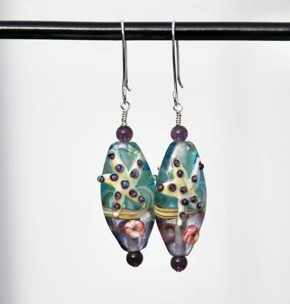 KarmaKittyJewel's tweet photo. #Lampwork #amethyst #beach #etsyhandmade #etsysocial #etsyjewelry https://t.co/evnSMKng3i #starfish #etsyearrings #vacation #seashore #starfishearrings @etsy #EtsySeller #etsystore #etsygifts #handmadejewelry https://t.co/6guvCjoCga