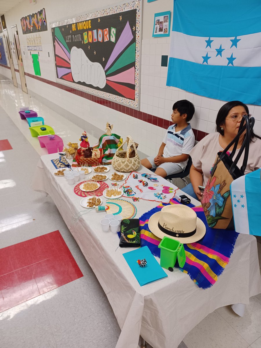 rmlester's tweet photo. Hispanic Cultural Night @Stephens_Stars is amazing! Beautiful displays, delicious food,  and many families celebrating. @gisdnews https://t.co/gyfhPmDN4T