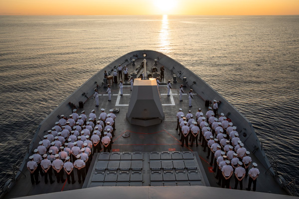 Australian_Navy's tweet photo. During the sea phase of #ExKakadu 2022, #HMASHobart's ship's company participated in a sunset memorial service to honour the life and service of Her Majesty Queen Elizabeth II. 🌅

📸: LSIS Tara Morrison #PartnershipLeadershipFriendship #KA22 #AusNavy https://t.co/4PrDBV9awz