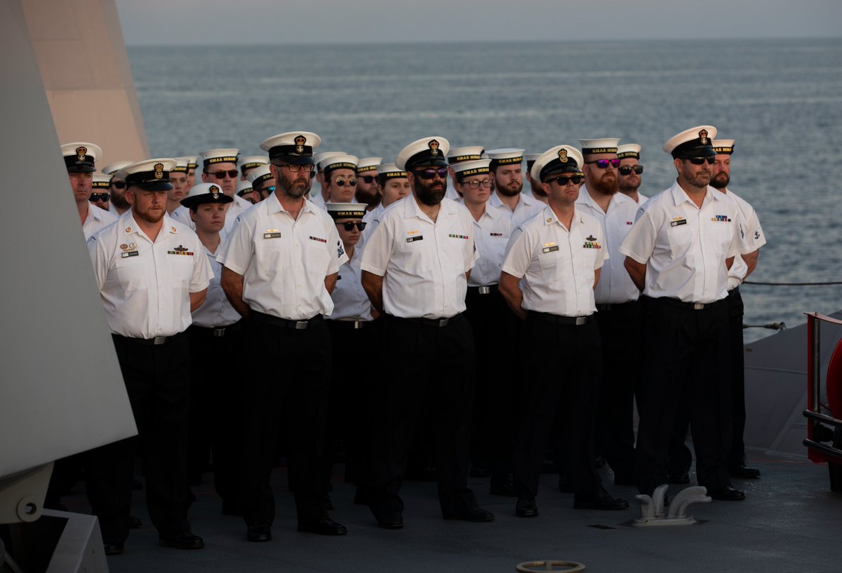 Australian_Navy's tweet photo. During the sea phase of #ExKakadu 2022, #HMASHobart's ship's company participated in a sunset memorial service to honour the life and service of Her Majesty Queen Elizabeth II. 🌅

📸: LSIS Tara Morrison #PartnershipLeadershipFriendship #KA22 #AusNavy https://t.co/4PrDBV9awz