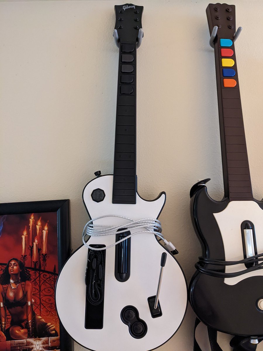 BigTallNotSmall's tweet photo. Did I ever show you guys my Guitar Hero controller collection? 

Big shout-out to @amp_mods for my latest addition on the left. I finally get to try out some mechanical frets on a modded Wii GH guitar. It was a great birthday this year! https://t.co/YMewrRus1i