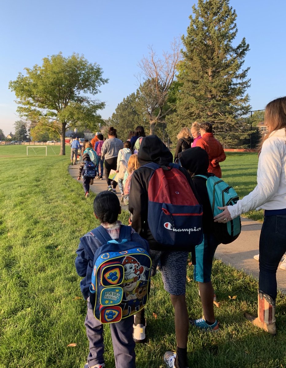 DRCOGorg's tweet photo. The 26th National #WalkRollToSchool Day is Oct. 12! The annual event supports safe, active travel for students and families. Sunrise Elementary in Aurora, Colo., celebrated Oct. 5 with a banner to sign provided by #WayToGo at #DRCOG. @walkrollschool  https://t.co/1ORip3Ya6U https://t.co/NF2bgabZK6