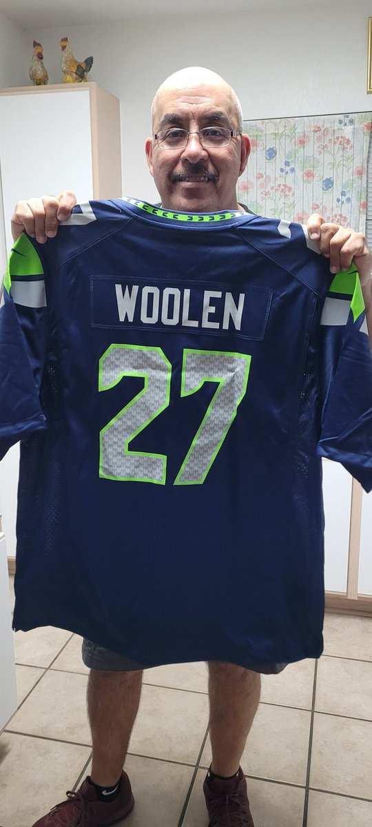 RBoogie33's tweet photo. Early Bday gift from the wifey. Definitely had to get me one of these @_Tariqwoolen jerseys. Next goal , to go to a @Seahawks home game.
#UTSAFamily
#SupporttheRunners
#210TriangleOfToughness
#FutureROY https://t.co/u5zuBuvrbi