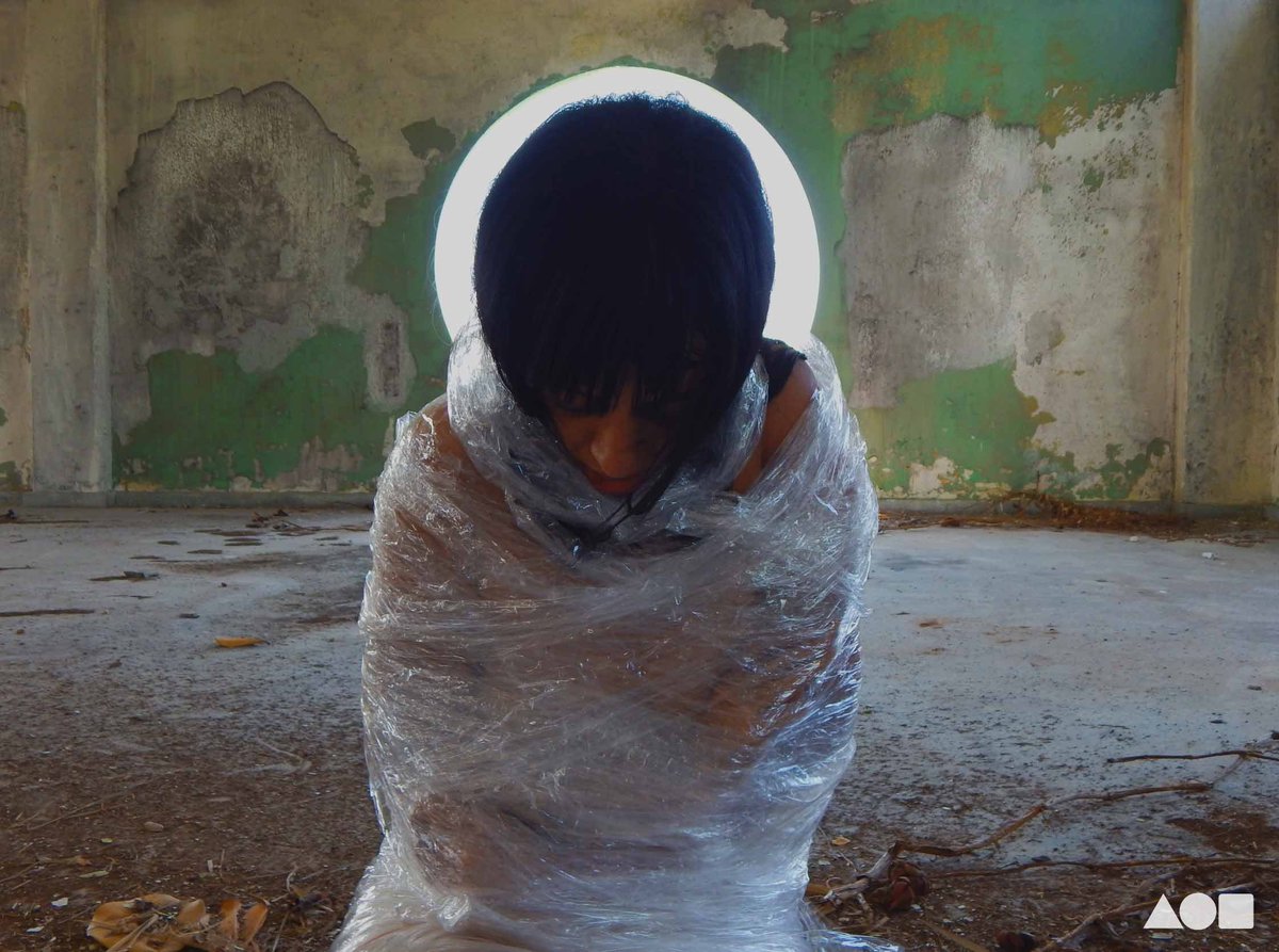 From Epitelio, photography of one of my performances in abandon places.
I explore de relationship body-architecture, creating site for reaction, contemplation, reflection, and questioning. Here I show you the sensation of being trapped in a social fabric skin. 
Reserve: 0.07 $ETH