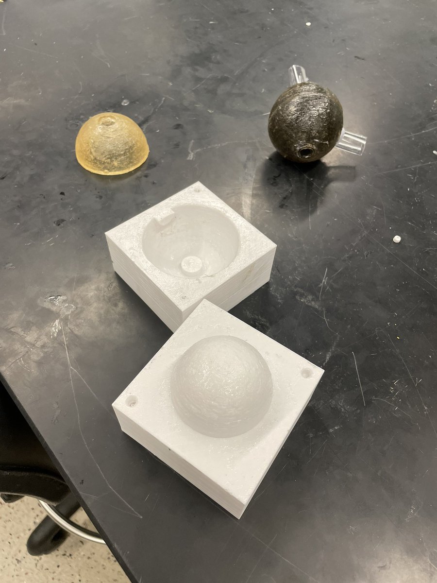 EpicsMobility's tweet photo. This image has a lot to process!!! In the back right of the image, you can see a fully assembled sphere sleeve. To the left of the sleeve is a single part of the sphere, which is made by the molds in front of it. https://t.co/Q6fWn0trhm