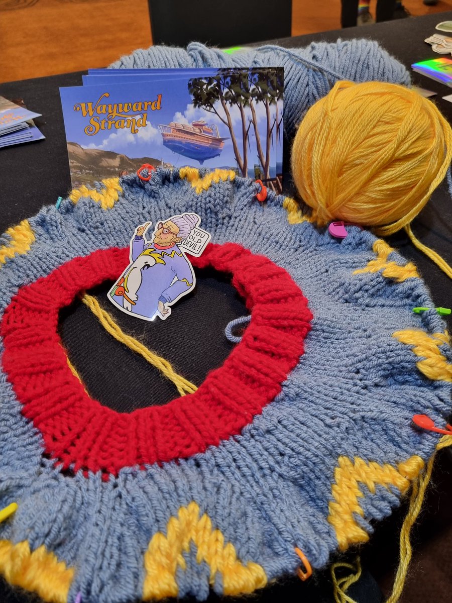 aspenforster's tweet photo. Making some progress knitting Esther's jumper at the @WaywardStrand table at #PAXAUS https://t.co/MNOYhxugXW