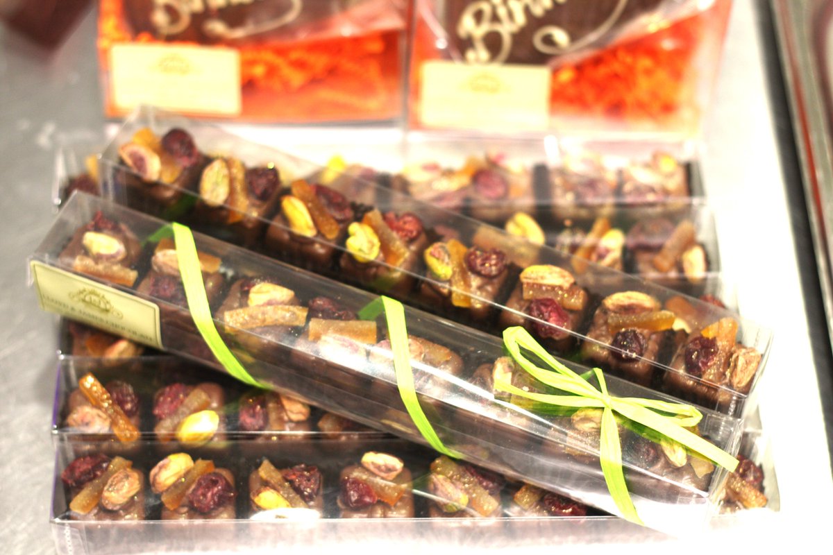 Now the colder weather has arrived, we're concentrating on our autumn comfort food. This morning I've made our fruit and nut chocolate parcels. A solid chocolate parcel topped with orange peel, pistachio and cranberry, dusted with gold sparkle. Really tasty.