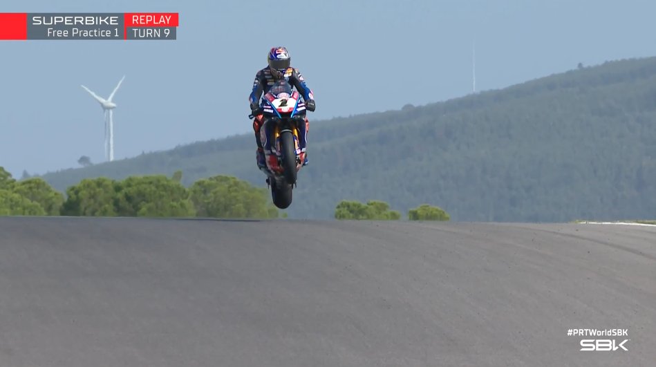 WorldSBK's tweet photo. There are no words... 🤯

@toprak_tr54 delivers one of his greatest stunts yet at Portimao's famous Turn 9 😍

#PRTWorldSBK 🇵🇹 https://t.co/yNUNJjQtqV