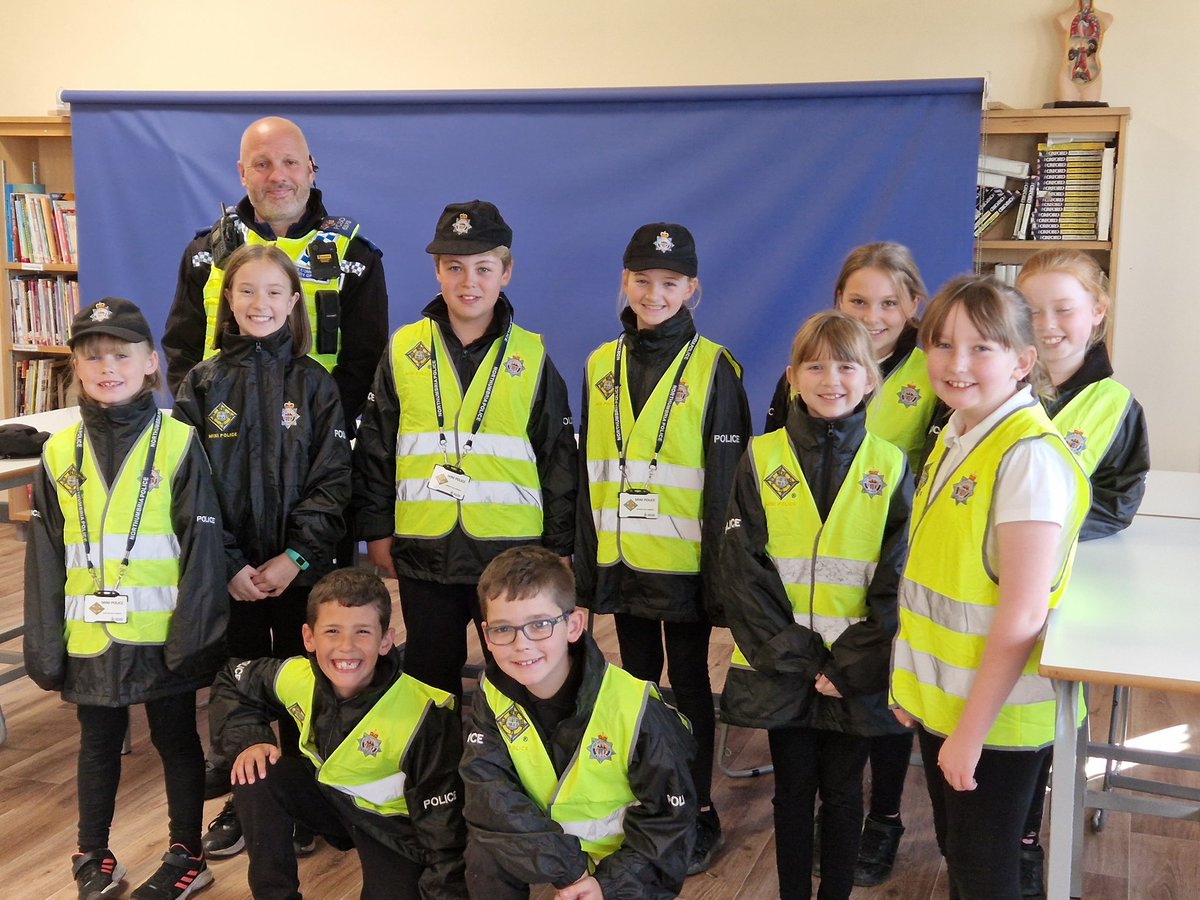 Welcome to our new mini police recruits. They can't wait to get started!