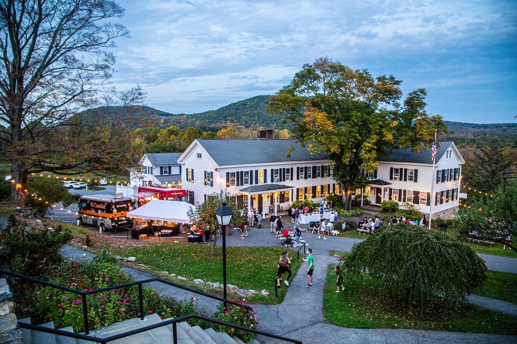 Families gathering outside South Kent School during Fall Family Weekend