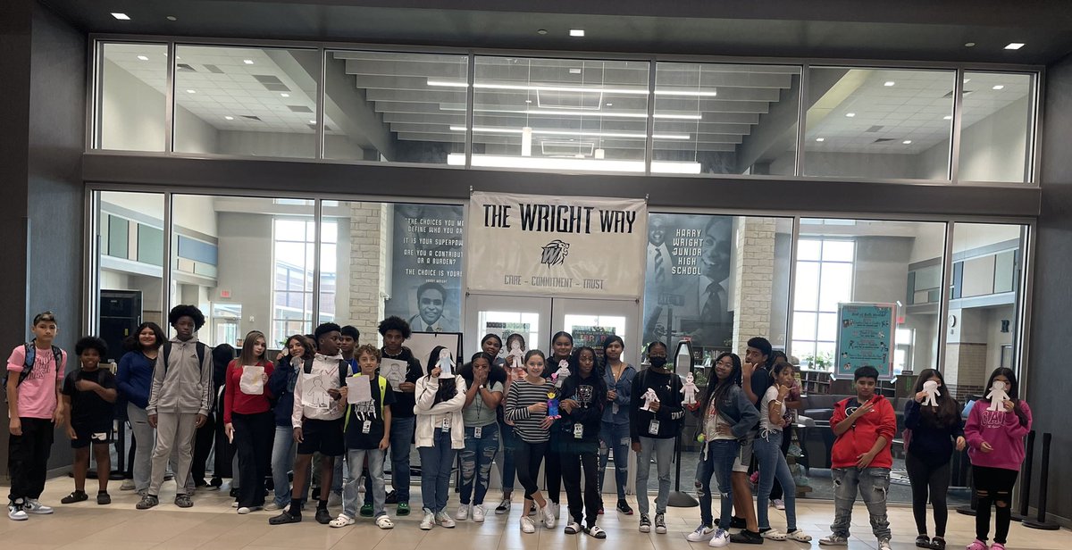 Where is Flat Stanley taking pictures for Yearbook?