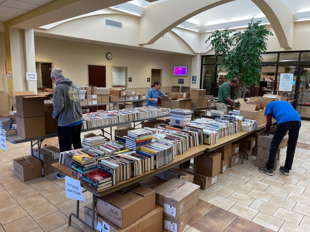 mykpl's tweet photo. 📚 The Friends of the Library volunteers are hard at work getting the space ready for you. $5 a bag all weekend long PLUS you have the opportunity to take home some beautiful wooden chairs for only $5 a chair while supplies last. See you at 10 am! 📚 #mykpl #booksale #folkenosha https://t.co/PylBhSpFnA