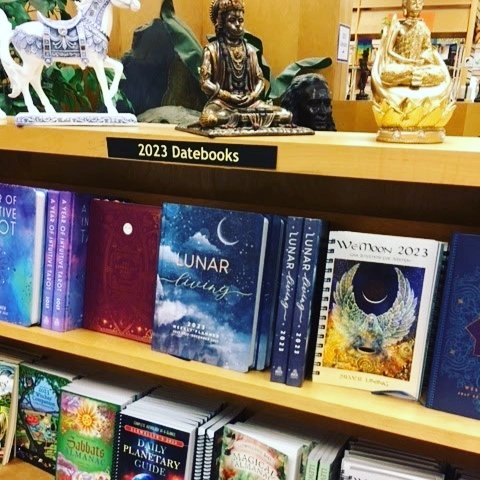 EastWestBooks's tweet photo. What's on our floor these days? Some tricks &amp; treats for your Samhain, a selection of glazed ceramics from Raku Pottery, our huge selection of 2023 wall calendars and notebook calendars/date books, &amp; some wearable manifestation aromatherapy scents!Stop by this weekend! https://t.co/fnUpBrcrlR