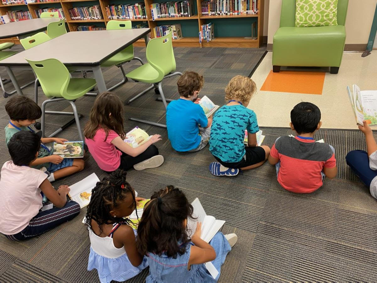 Our first graders are so excited to be reading their library books!