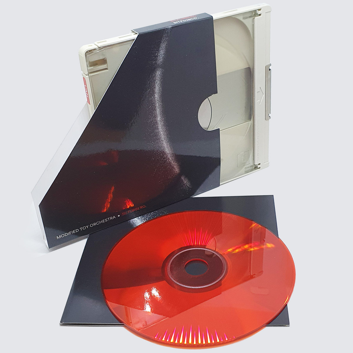 Bleep (@bleep) on Twitter photo Pre-Order Now:
Modified Toy Orchestra - Silfurberg
<a href="/BitPhalanx/">Bit-Phalanx Music</a>
bleep.com/release/341809
+ All-Red Polycarbonate CD
+ Vintage CD-Rom Caddy with
+ 12 page booklet
+ Housed in bespoke O-card sleeve and sealed in a stickered mylar bag Pre-Order Now:
Modified Toy Orchestra - Silfurberg
<a href="/BitPhalanx/">Bit-Phalanx Music</a>
bleep.com/release/341809
+ All-Red Polycarbonate CD
+ Vintage CD-Rom Caddy with
+ 12 page booklet
+ Housed in bespoke O-card sleeve and sealed in a stickered mylar bag