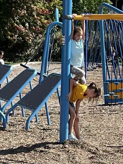 laurie_ringe's tweet photo. These two students of mine have been working on getting to the top of the bars this whole week. They remind me of the people I work with and of my family that would do anything to support me when I need help. I’m so grateful. #SecondGradersRock #MyHeartIsFull https://t.co/9p7aJd8MPD