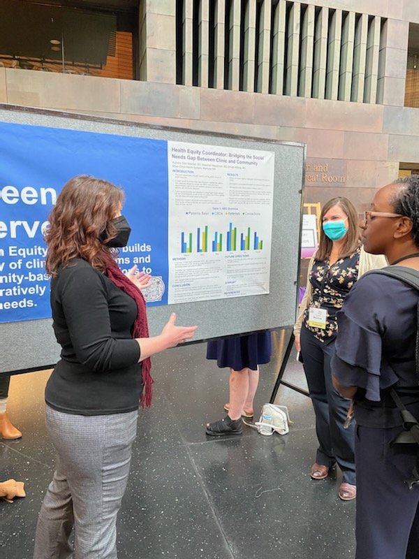 MNFamilyDocs's tweet photo. MN's @DrErinWestfall &amp; Gretchen Mauerman of @FamMedMankato presenting on how #healthequity coordinators can help bridge the social needs gap between clinic &amp; community. #FMMidwest22 #FMRevolution https://t.co/qJVyM3KlWL