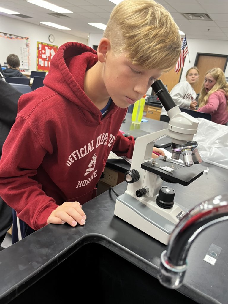 Mr. Papson’s science class using their newly learned microscope skills to observe and diagram different biological specimen slides. #TimberwolfWay