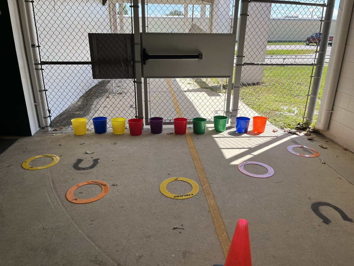The other game was called “paint by numbers” where we took multicolored balls and tried to toss them using both hands into the matching colored bucket. This took place on Oscar track!