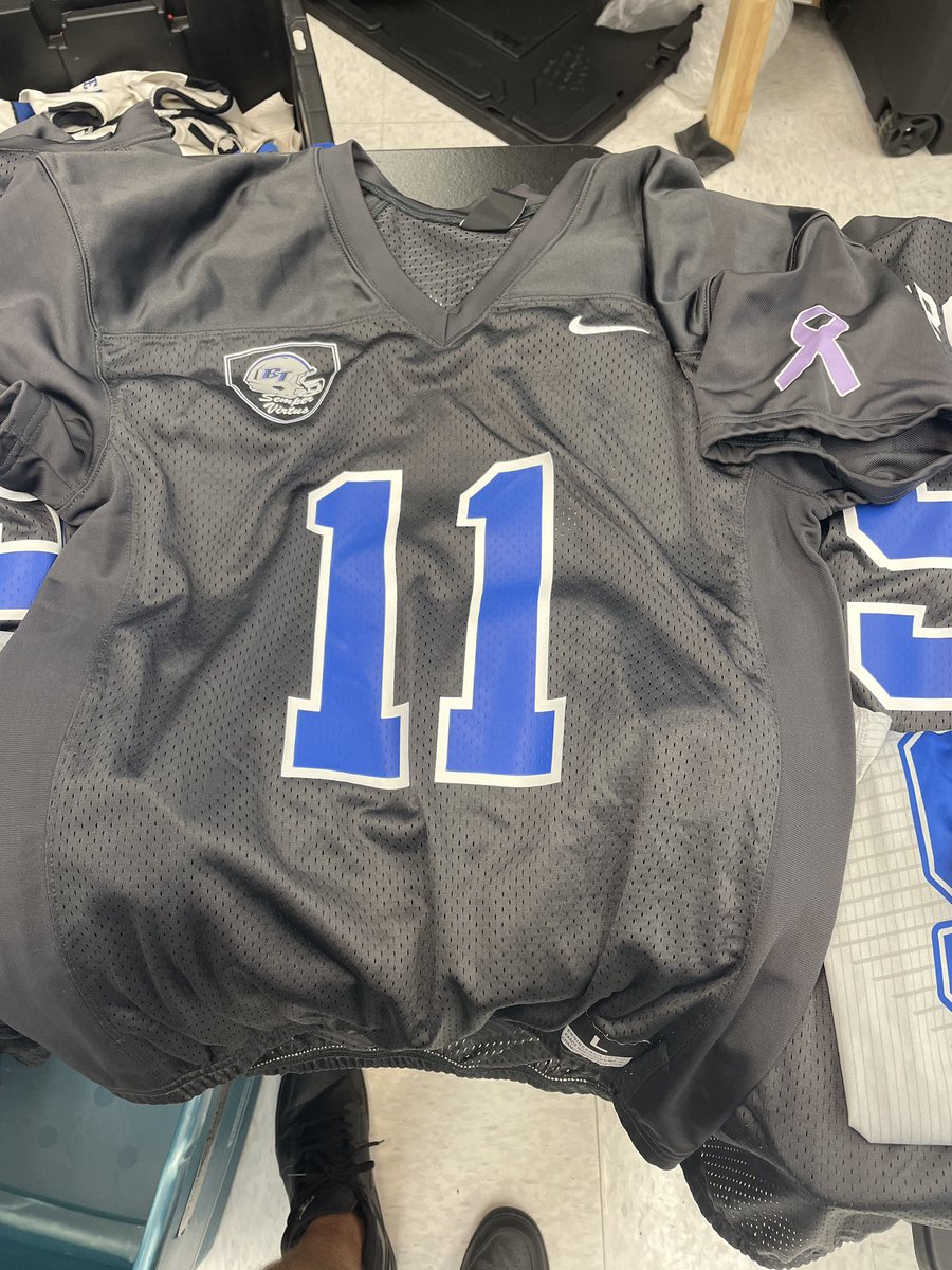CoachCWheeler's tweet photo. Excited to be able to attend @BTHS_Football’s game tonight. It’s their annual “Honor” game. Humbled that Charlotte was asked to participate &amp; grateful for good friends and their unwavering support. #Pray4Charlotte This is the jersey that QB Riley Trujillo will be wearing! 🐻 🏈 https://t.co/4mFuEN2Ubm