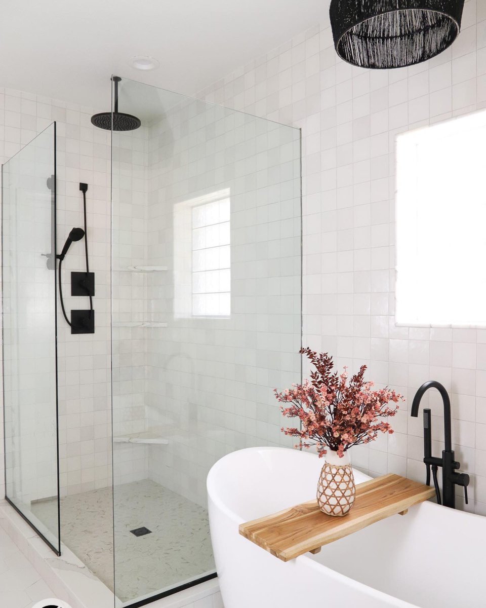 Fresh + clean master bathroom remodel, we're loving the floor to ceiling tile!

Shower Tile: Cloe 5x5 in White bit.ly/3fssMcS

Designed by alainaatwooddesign