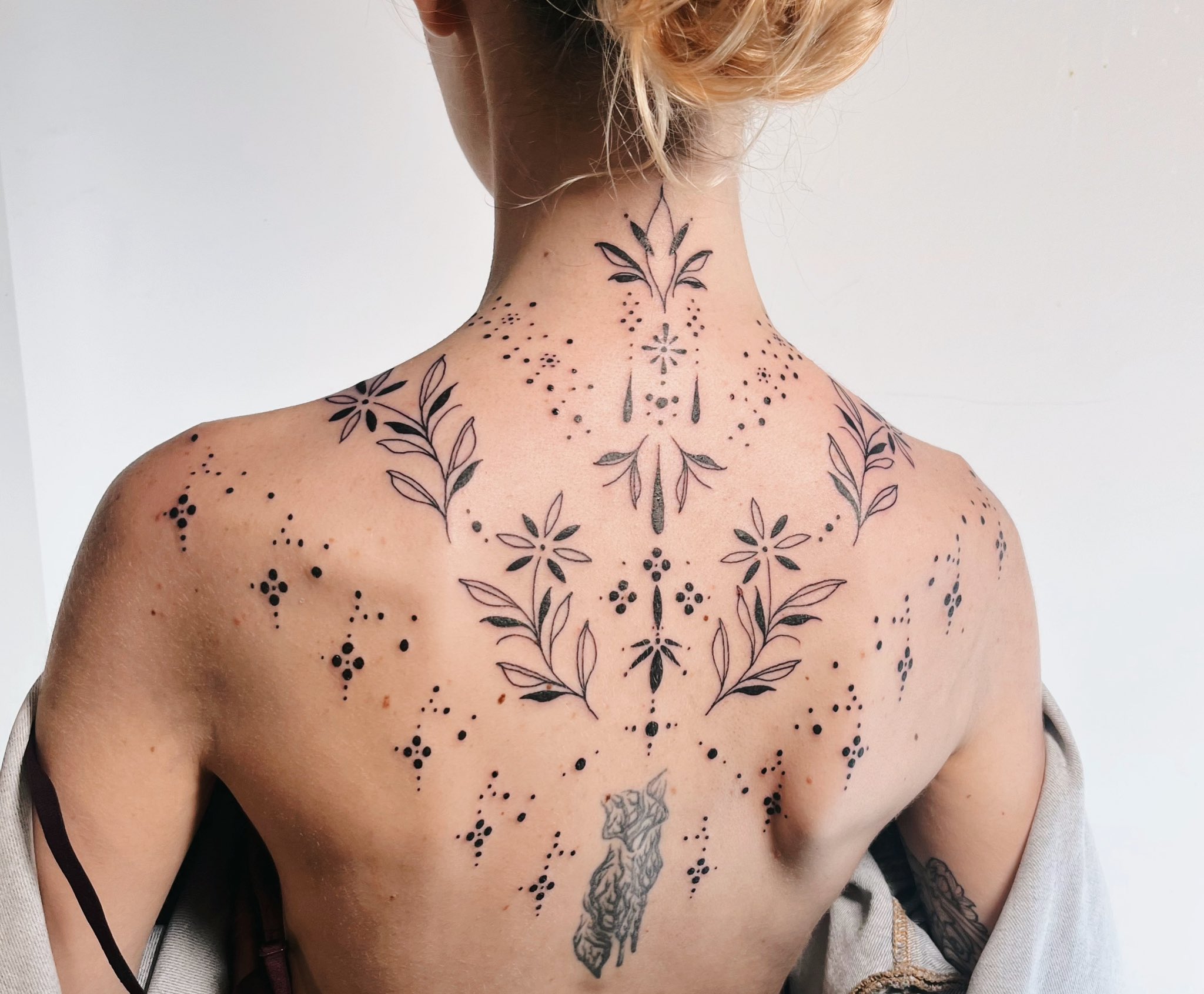 25 Symmetrically Satisfying Connecting Tattoo Designs  TattooBlend