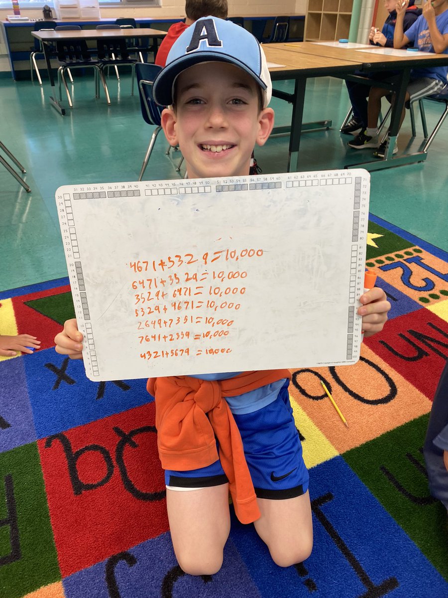 Using each digit only one time, create an equation with the sum closest to 10,000. Today I learned there are multiple answers to this problem! These fourth graders truly understand place value!