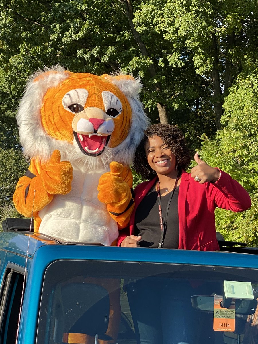 Coach_Hoffert's tweet photo. Come and meet new @LJMS_FCPS principal, Ms. Raven Jones, appearing with Jackson the Tiger at the @FallsChurchHS homecoming parade RIGHT NOW! #WeROARasONE https://t.co/MSX26Cyif2