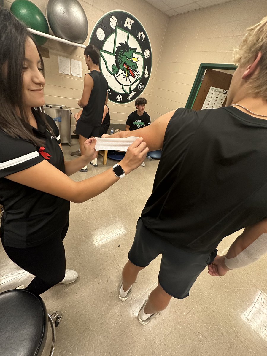 DragonSportsMed's tweet photo. Win the pregame ✅. Also - big shoutout to Eubanks Intermediate  student Callie for joining us for pregame! You did awesome in helping the team behind the team! @CABCSLC @EubanksDragons https://t.co/lMEhbYFkYe