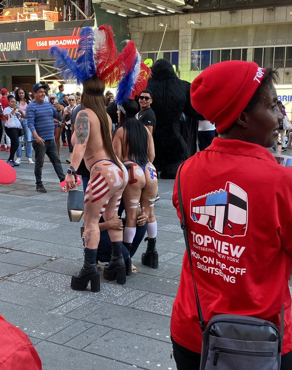 Times Square Friday afternoon. Ignoring the markets.