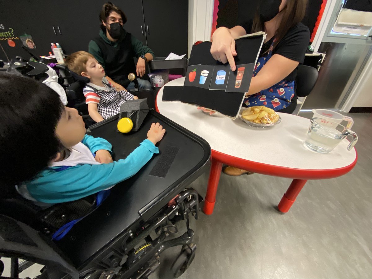 bridgeschool's tweet photo. The preschoolers had a blast making applesauce today! After pouring in the ingredients and boiling the apples, both students used a hand switch to control the stand-up mixer. Who’s hungry? #aacawarenessmonth #aacaware22 https://t.co/DWBnypfGJ2