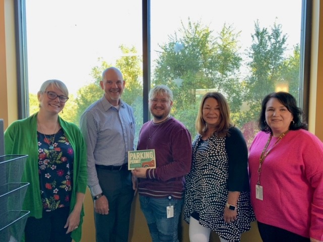 MoDNR's tweet photo. Congrats to Forrest Luck for receiving a Director's Parking Pass. Forrest is MoDNR's lead for the Missouri State Employee Charitable Campaign. Thanks to his creativity and magical🎩🐰 efforts, our agency has raised $38,164 so far. #CaringisMagical https://t.co/kWpESD7JUs