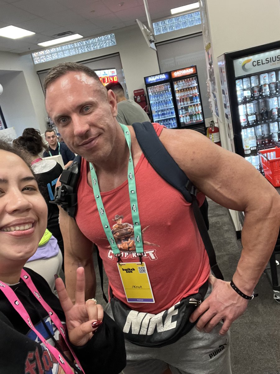 FlaccidBaron's tweet photo. Wife: Hey babe I met this guy named K-Nut at CVS. He was really swole so I got a picture with him. 

I love her so much. She had no idea who he was but wanted me to see his big muscles #TwitchCon https://t.co/uMqcuwH8zu