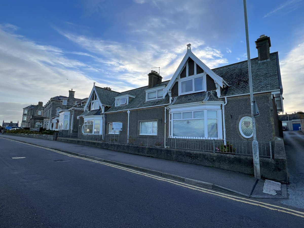 JLuGolfweek's tweet photo. The Links Lodge B&amp;B, overlooking @MorayGC, has one of the best from-the-room views in golf. Old town, Old Tom golf, little pro shop, clubhouse, lighthouse. I could stay all week. @golfweek @golfbreaks @VisitScotGolf https://t.co/ppYtSuJAQE
