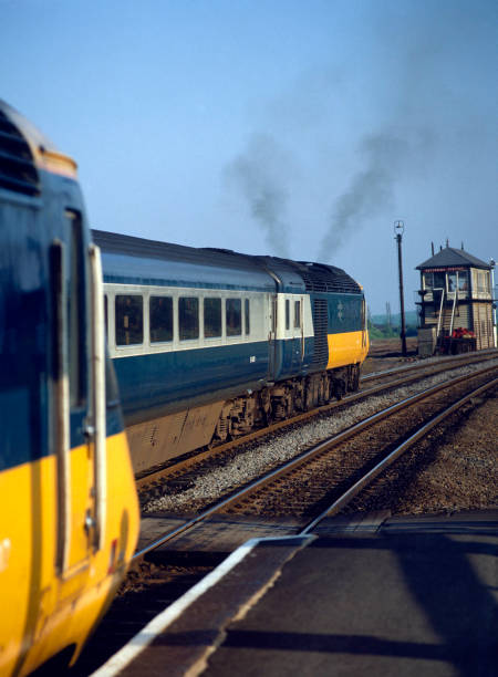 RailwayCentral's tweet photo. #HighSpeedSaturday.... A pair of #HST sets at #Kettering Station, The 18:15 #HST125 #Nottingham to #London #StPancrasΒ service departs passing the St Pancras to #Derby service 08/06/84....
#Class43 #InterCity
@RailwayCentral https://t.co/FzQst4we21