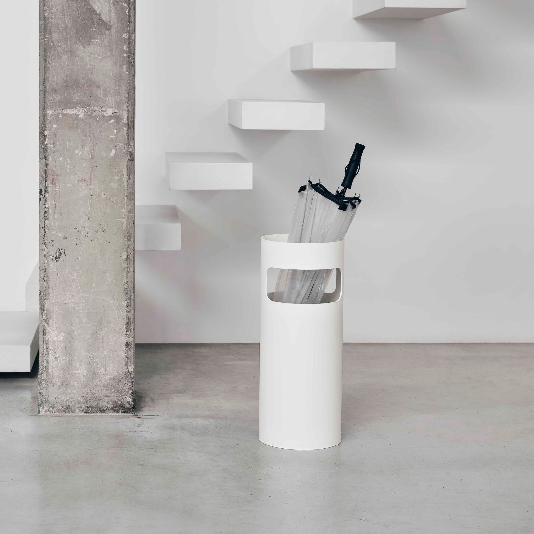 A classic of the Sixties, the multifunctional and indestructible umbrella stand is an injection moulded cylindrical container available in a variety of colors and in a new recycled version. With two side openings, it can also be used as a waste bin. #Kartell