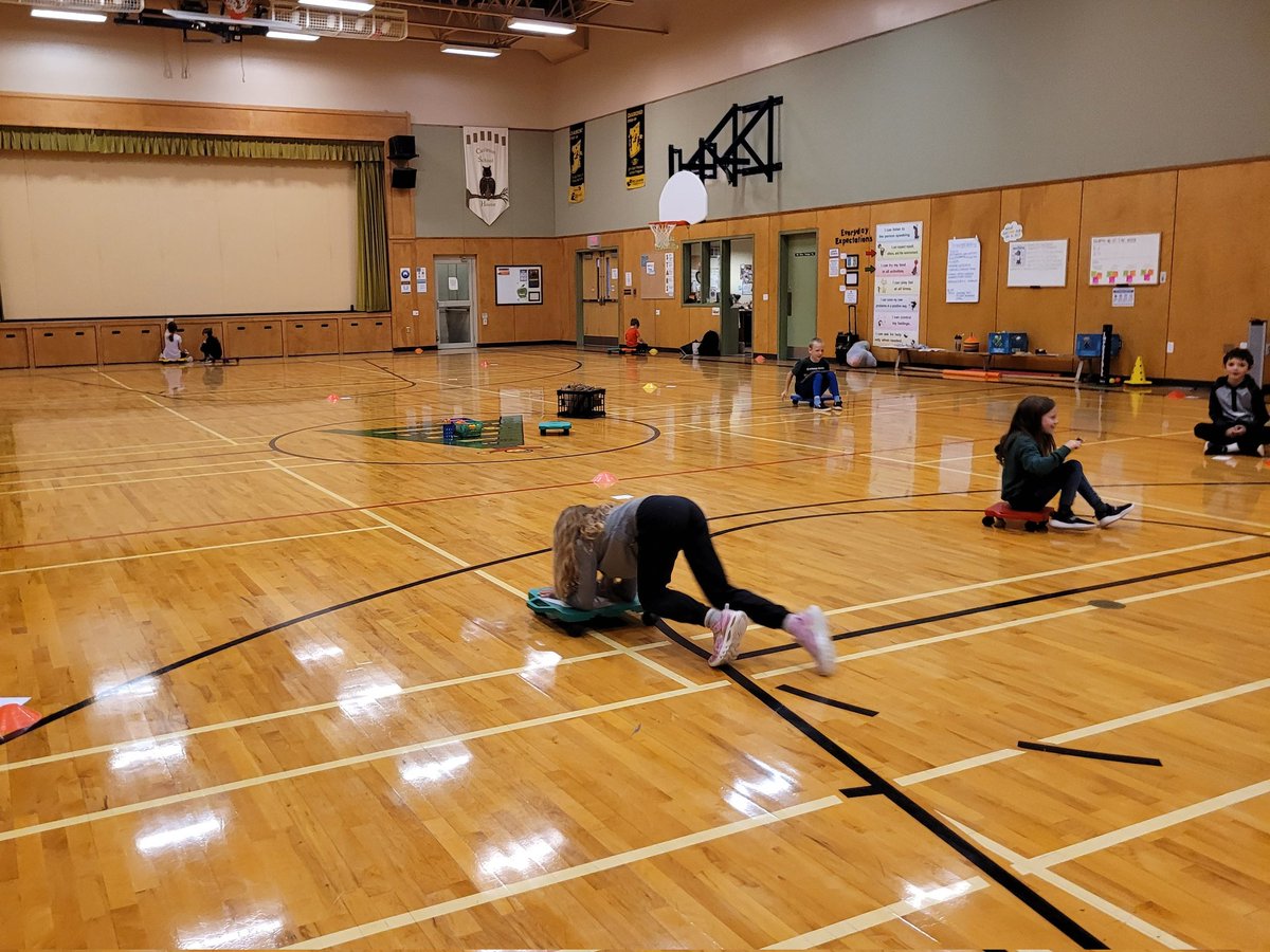 physedteachCCES's tweet image. When your PE teacher is also your grade 3 Math teacher...we scooted for Scoot! #perks #mathmovement #numbersto1000 #scooterboards #watchuslearn @TCRCE_NS