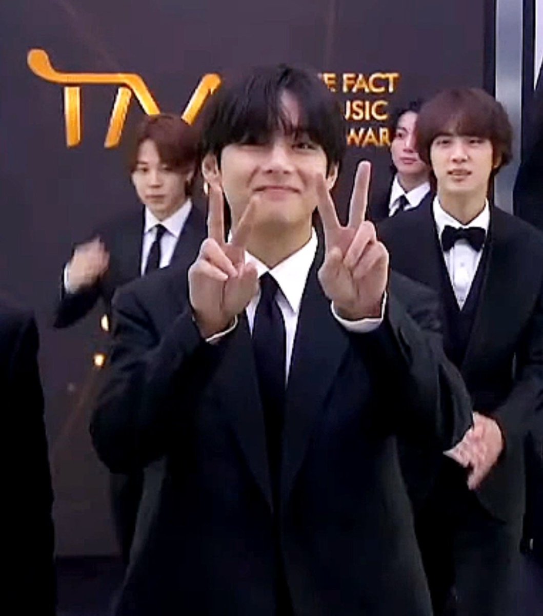 BTS' Kim Taehyung looking adorable at the 2022 The Fact Music Awards (TMA). #BTSonTMA2022