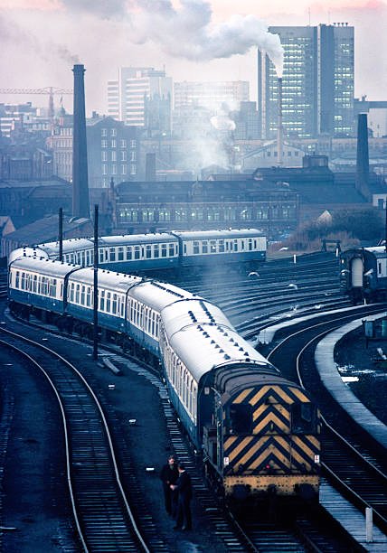 #SaturdaySidings.... A #Class08 doing what is does best, shunting passenger Carriages in the #Sidings in #Manchester 1976....📸#JohnBulmer.... #ShunterSaturday #RailwayNostalgia @RailwayCentral