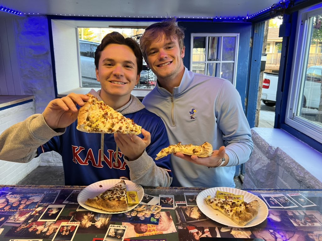 wheelpizzaco's tweet photo. First slices of the day for Jake and Henry! Grab some breakfast slices on your way to #fillthehill and #packthebooth! 

LET’S GO, JAYHAWKS! @KU_Football https://t.co/hJLNasZjXV