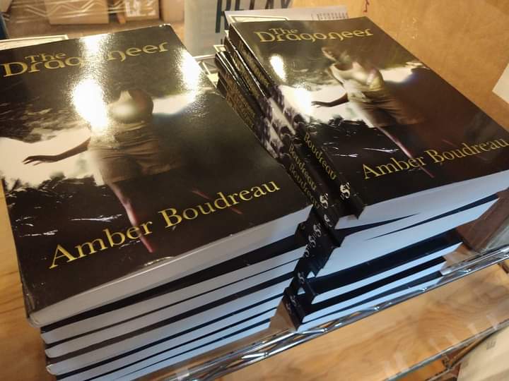 AnAmberAuthor's tweet photo. Signed this pile of books two years ago today. Will be signing more next week at the Twin Cities Book Festival at the Minnesota State Fairgrounds. Come and find me! #TCBF #booksof2022 #TheDragoneer #TDTP https://t.co/rhOKZFQJpz