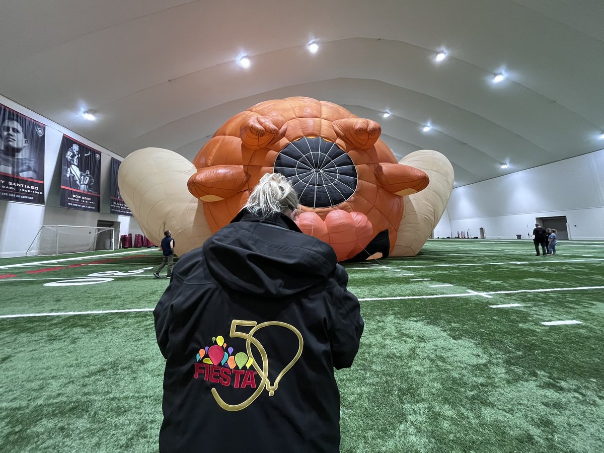 UNMLOBOS's tweet photo. We LOVE balloon Fiesta, but last night’s rainstorm that popped up out of nowhere could permanently damage a balloon if it stays wet.

Whelp, these balloon needed a big space to dry out…and we helped! #GoLobos https://t.co/CAAEZXvvK3