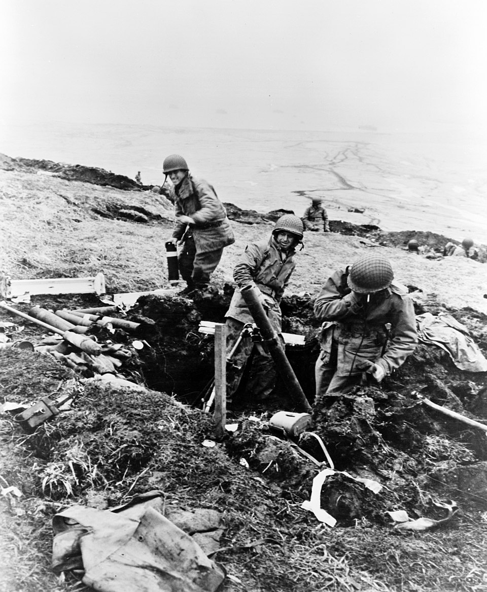 WW2Facts's tweet photo. U.S. soldiers fire mortar shells over a ridge onto a Japanese position during the Battle of Attu June 4, 1943.

#History #WWII https://t.co/HsPCTfGkYV