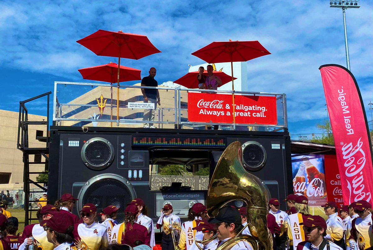 GrahamRossini's tweet photo. No better way to celebrate #GreenGameASU than with a solar-powered boom box! Thanks to @CocaCola @SwireCC for joining game day! #O2V https://t.co/xaAHKsbbvi